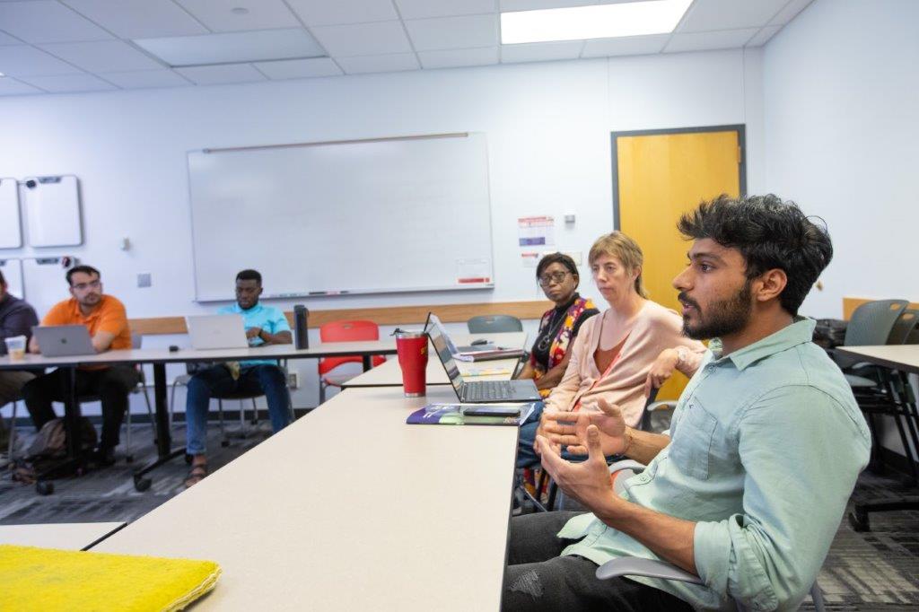 Students talking in classroom