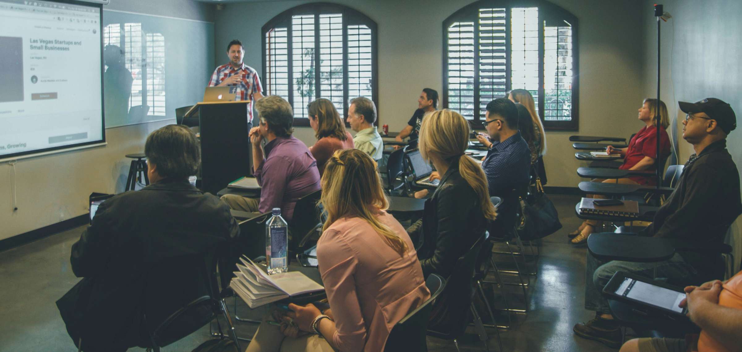 man presenting in from of classroom